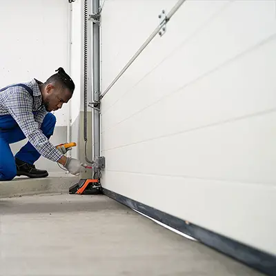 Réparation de porte de garage à Lyon – Dépannage 24